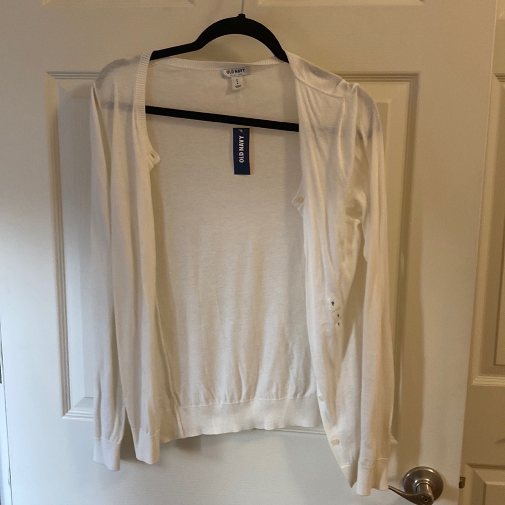 White cardigan. New with tags